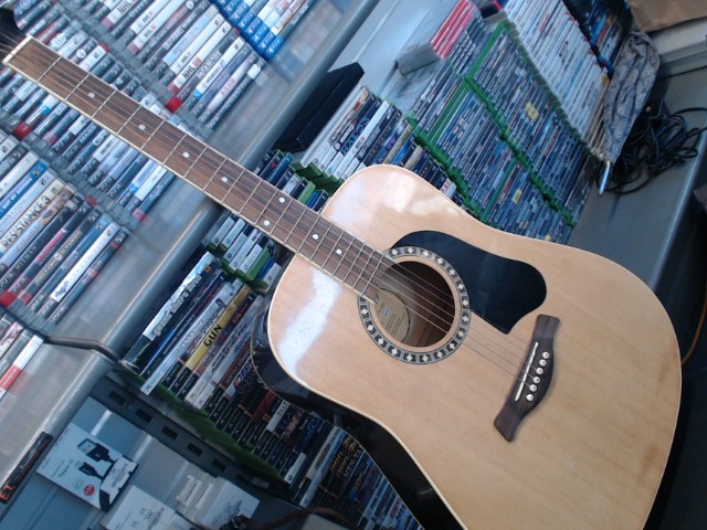 Guitare acoustique manque une cl�e bris�