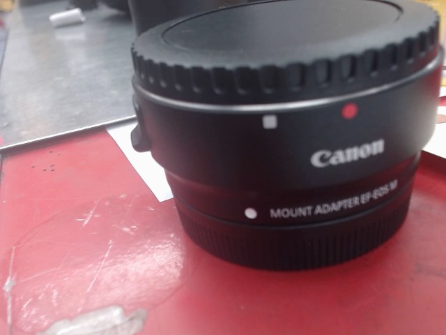 Adaptateur lentille