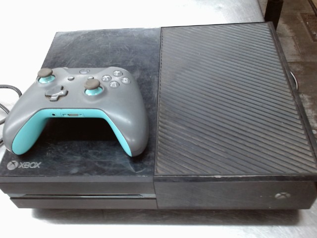 Xbox one avec manette et 17 jeux