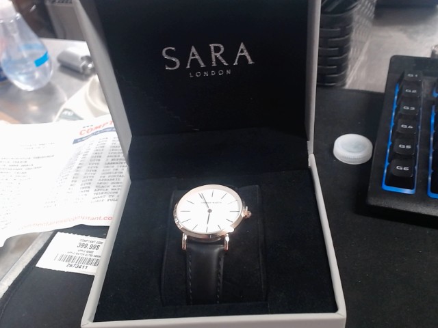 Gray boxe withblack watch white dial
