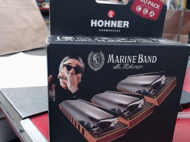 Harmonica triple