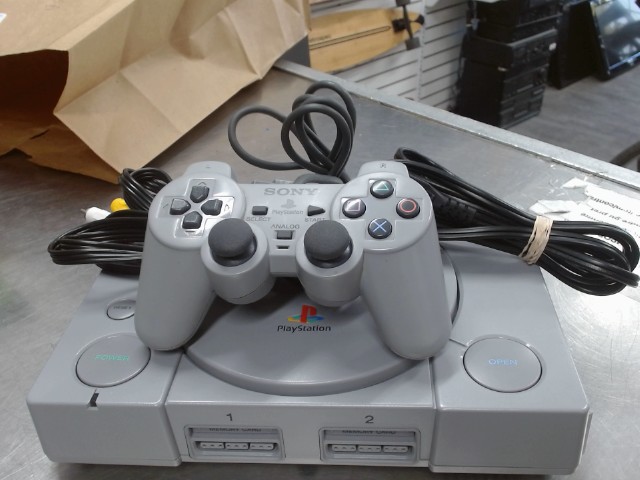 Console playstation 1 + man + fil