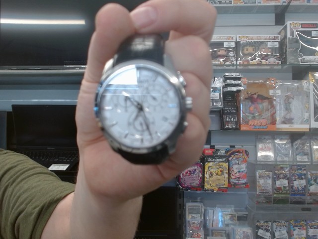 Montre tissot noir ecran blanc