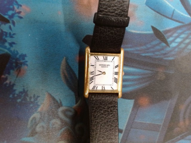 Montre raymond weil plaquer or