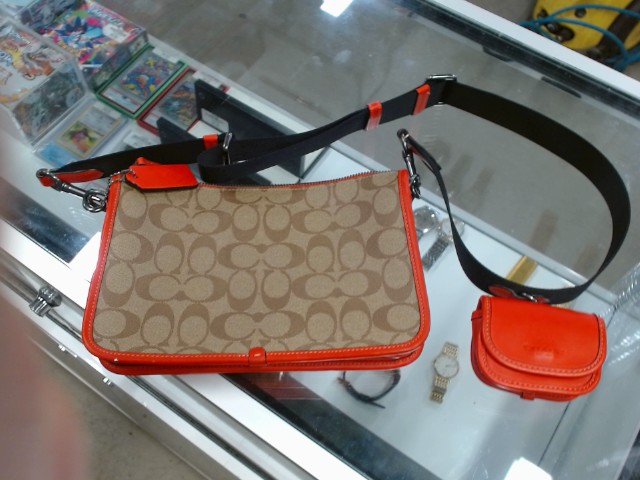 Saccoche coach rouge/monogram