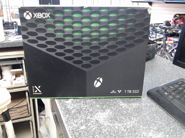 Console xbox series x + man + fils