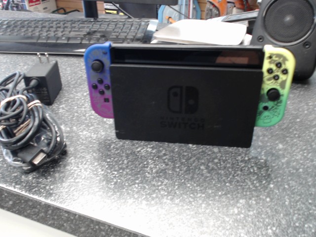 Console nintendo switch+doc+man+fils