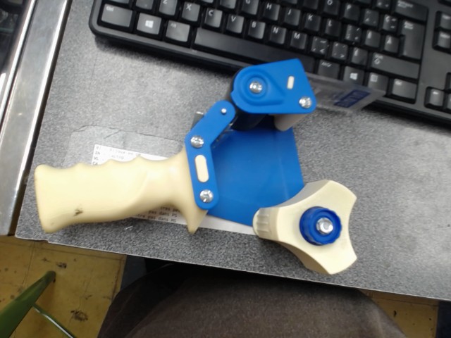Tape gun bleu et blanc