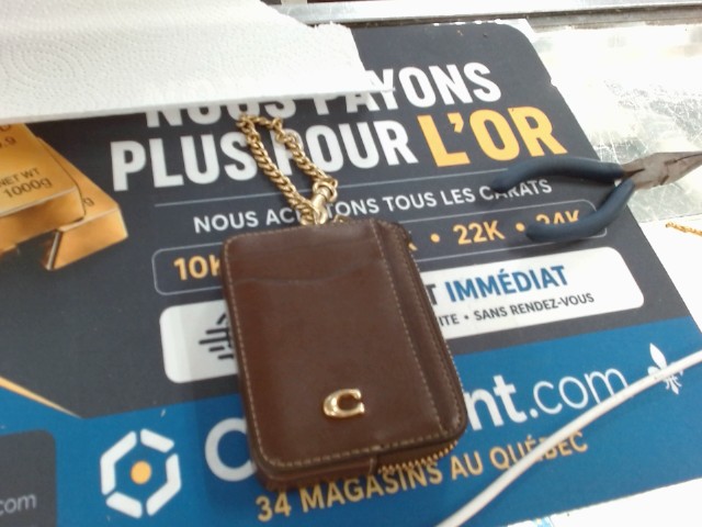 Portefeuille coach cuir