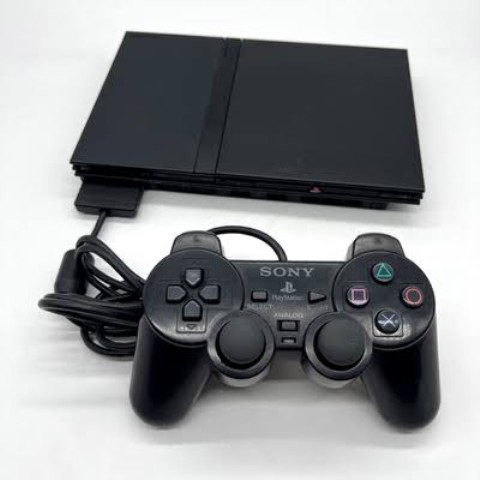 Ps2 slim noir av une manette