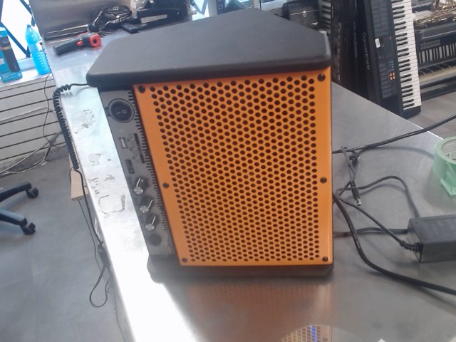 Orange speakker with black box