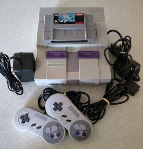 Super nintendo + fils + man x2