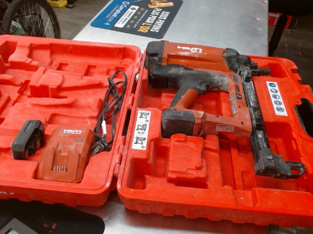 Gun a clou hilti dans coffre tagger noir