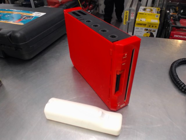 Nintendo wii rouge avec fils et man
