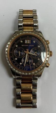 Michael kors montre manque batterie