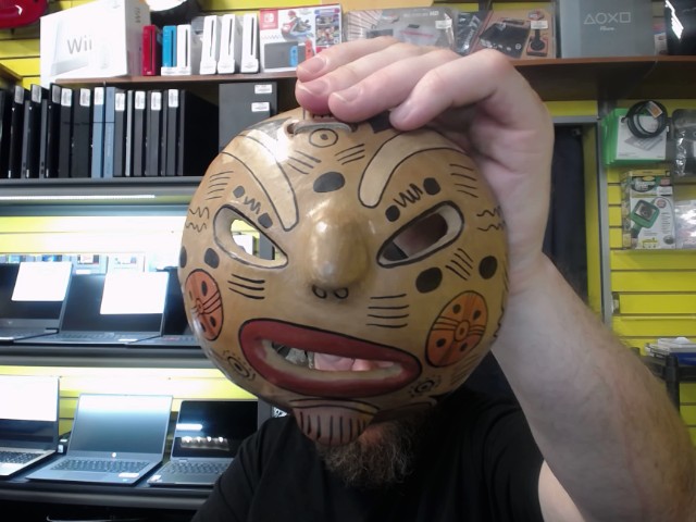 Masque africain en terre cuite