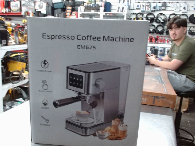 Machine espresso dans la boite