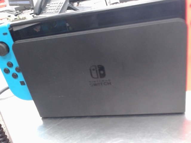 Switch oled mario wonder edition + dock