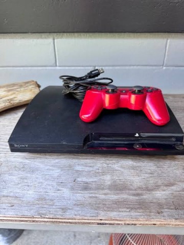 Ps3 avec manette rouge
