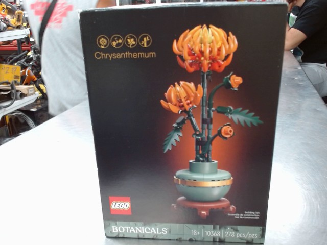 Lego fleur orange dans boite