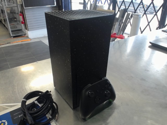 Console + man + fils 2 tb