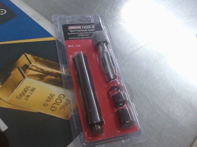 Spark plug repair system