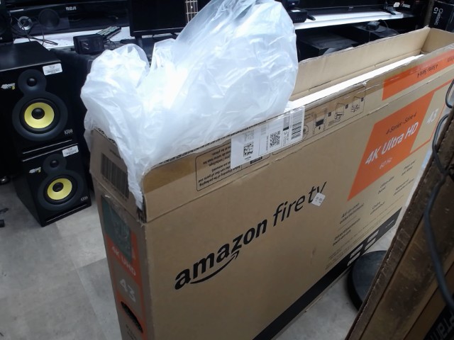 Amazon fire tv with box and accessories