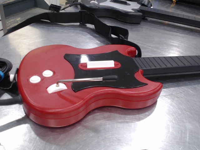Guitar hero a fils gibson rouge