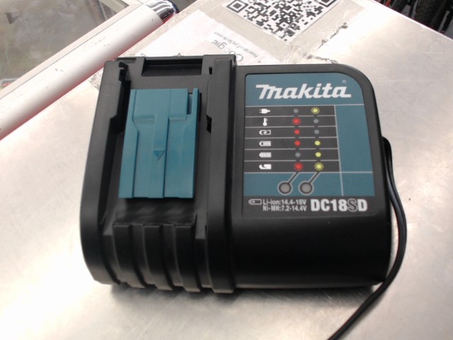 Chargeur a batterie makita comme neuf
