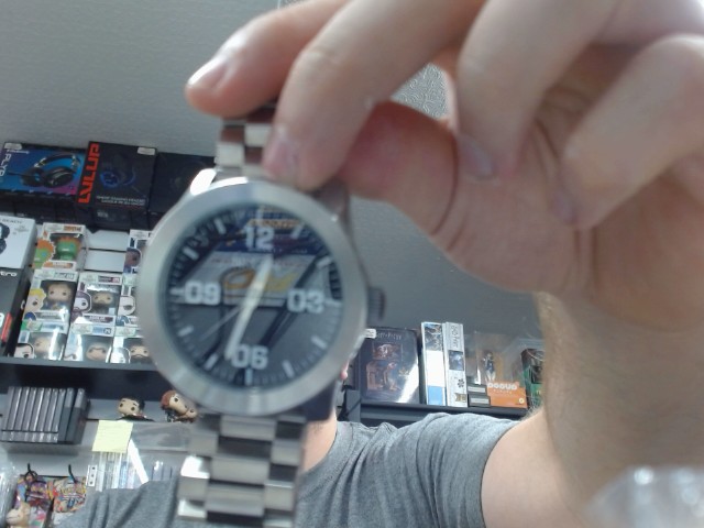 Nixon argent font noir