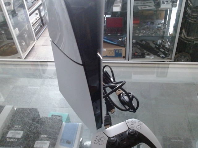 Console ps5 slim digital + man