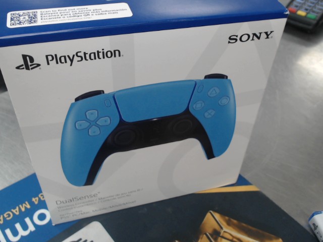 Manette playstation dans sa boit