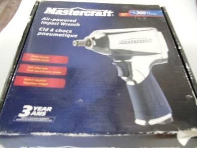 Air powered impact wrench