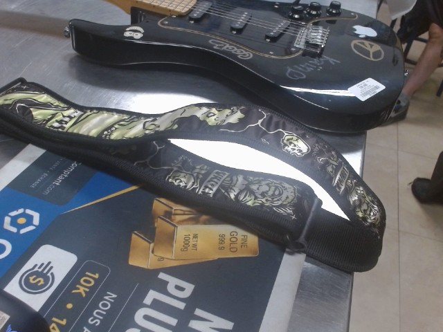 Strap a guitare