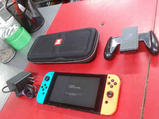 Console nintendo switch+etui+manette+chr