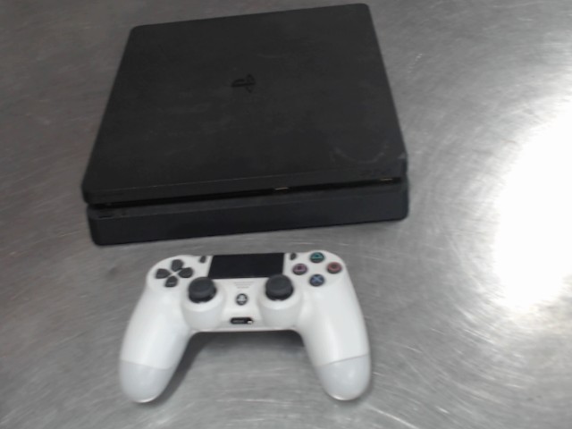 Console ps4+1manette sfil