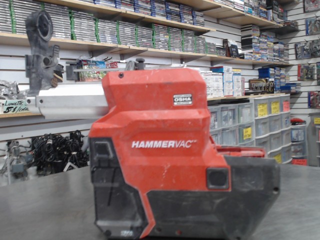 Dust extractor pour hammerdrill