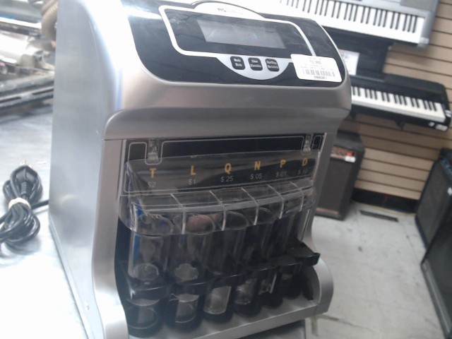 Machine a compter le change electrique