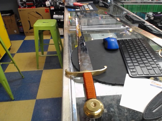 Replica sword with red handle