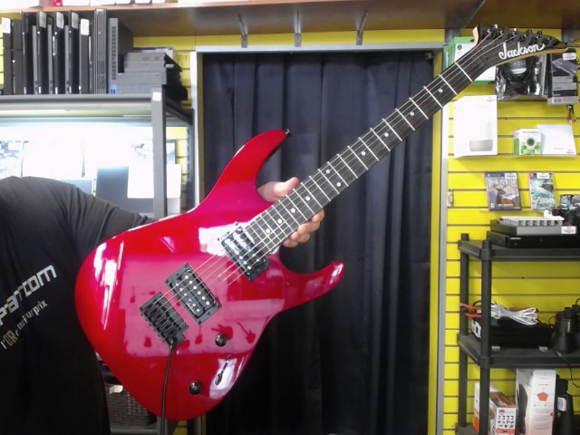 Guitare electrique rouge comme neuve
