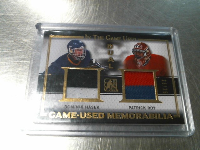 Dual game-used dominik hasek/patrick roy