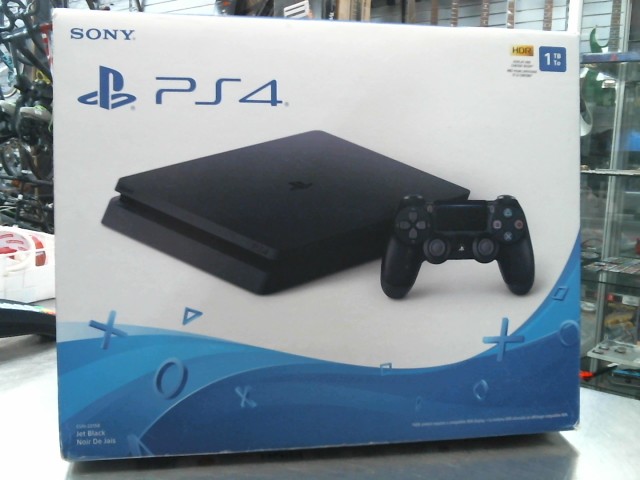 Playstation slim 1 tb avec boite et acc