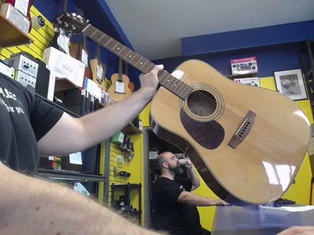 Guitare acoustique gauchere