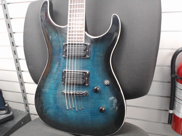 Guitare electrique bleu vert