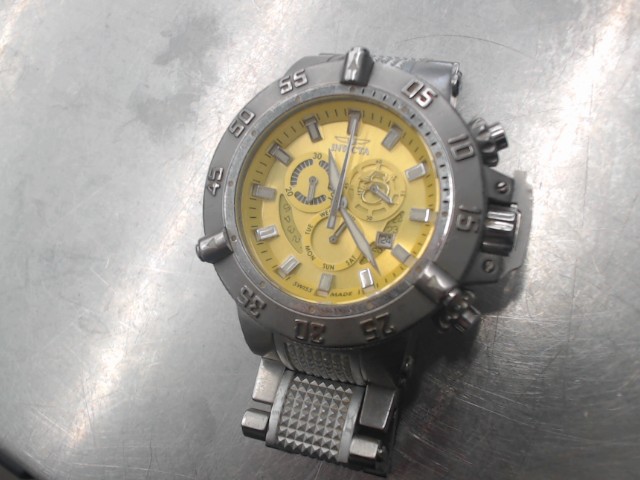 Montre invicta grise et jaune