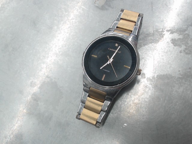 Montre caravelle quartz noir argent or