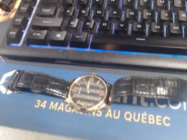 Montre guress plaquer gold pour homme