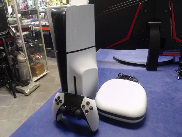 Console +accessoires manette elite