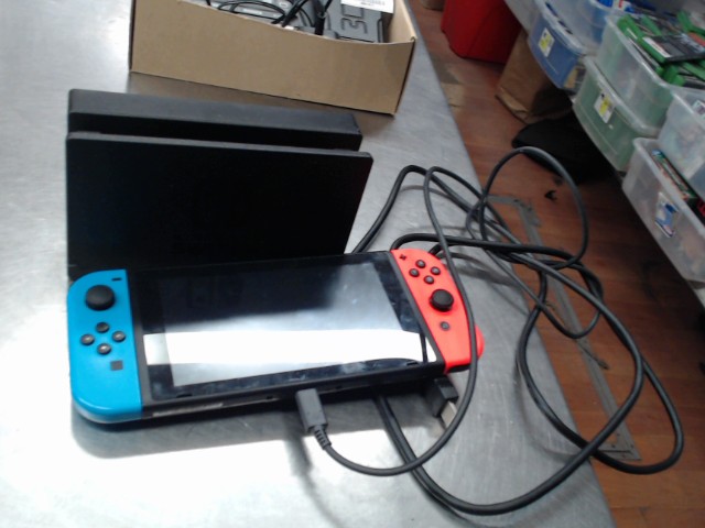 Nitendo switch +dock et fils
