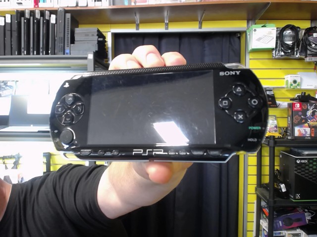 Console + chargeur, pile neuve 2200mah